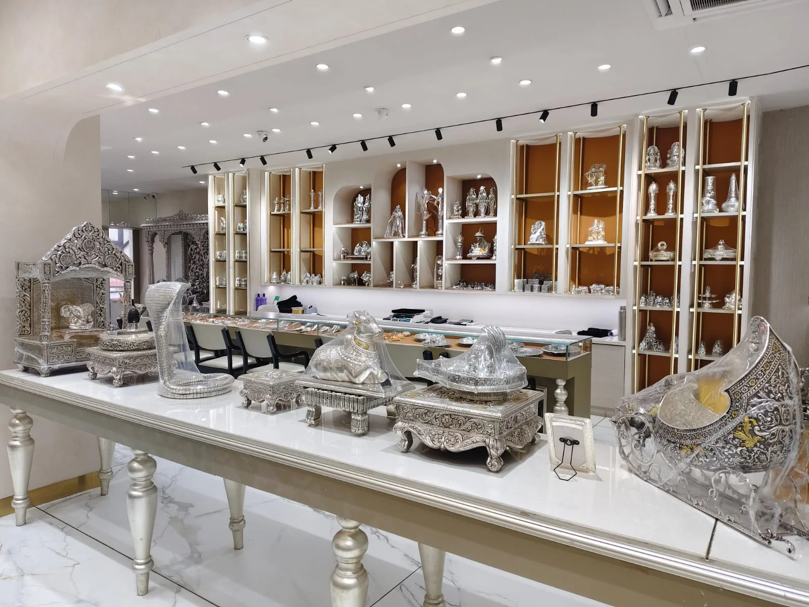 Silver collections displayed inside the Dharam Jewellers showroom